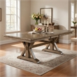 Pemberly Row Wooden Dining Table with Trestle Base and Expandable Leaf in Brown