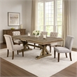 Pemberly Row Wooden Dining Table with Trestle Base and Expandable Leaf in Brown