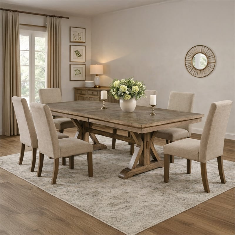 Pemberly Row Wooden Dining Table with Trestle Base and Expandable Leaf in Brown