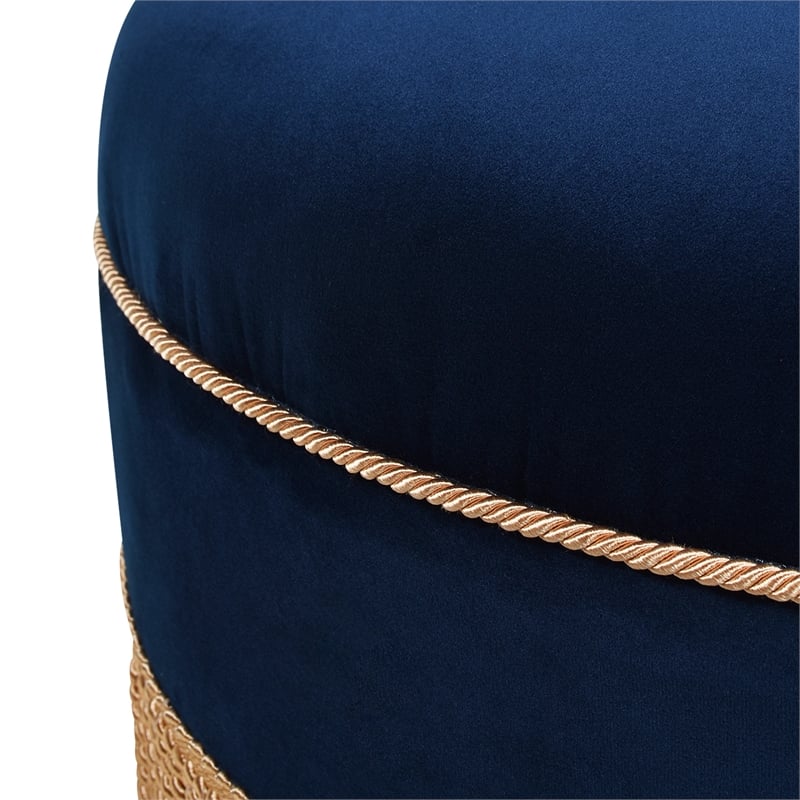 Pemberly Row Upholstered Round Accent Ottoman in Navy Blue Velvet with Gold Trim