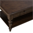 Pemberly Row Rectangular Cocktail Table with Casters and Open Shelf in Cherry
