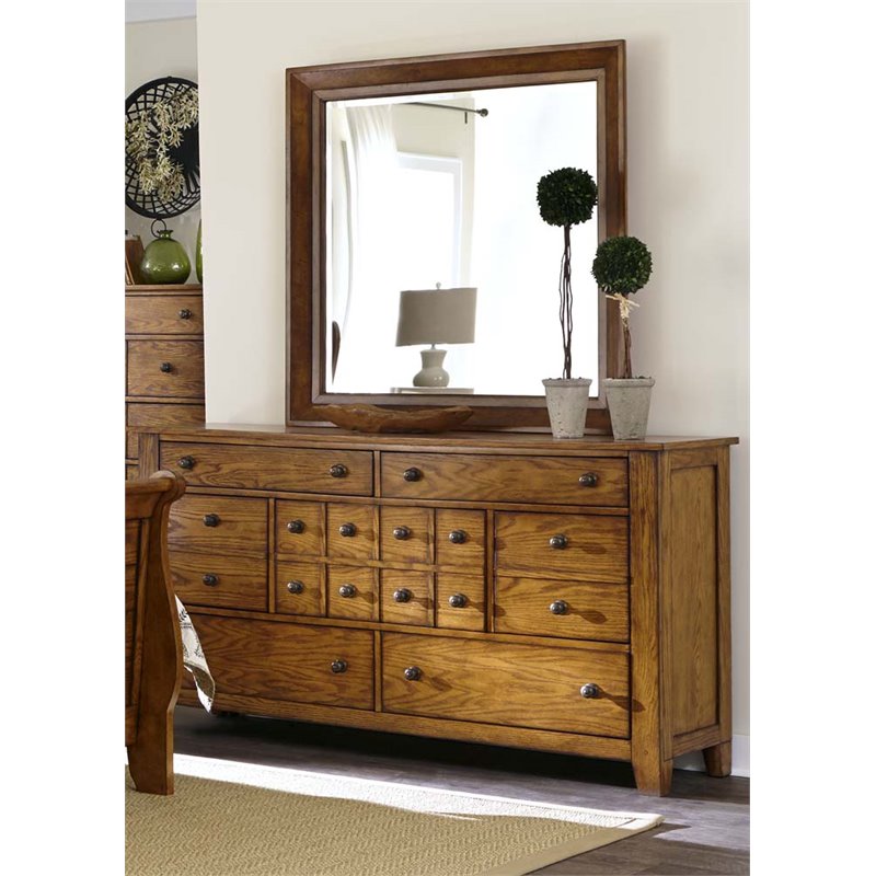 Pemberly Row 7-Drawer Dresser in Aged Oak Finish with Metal Glides