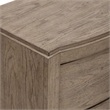 Pemberly Row Nightstand with Charging Station in Burnished Beige Wood