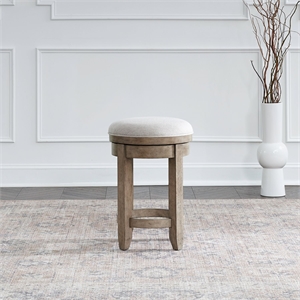Pemberly Row Upholstered Console Swivel Stool with Tapered Feet in Brown
