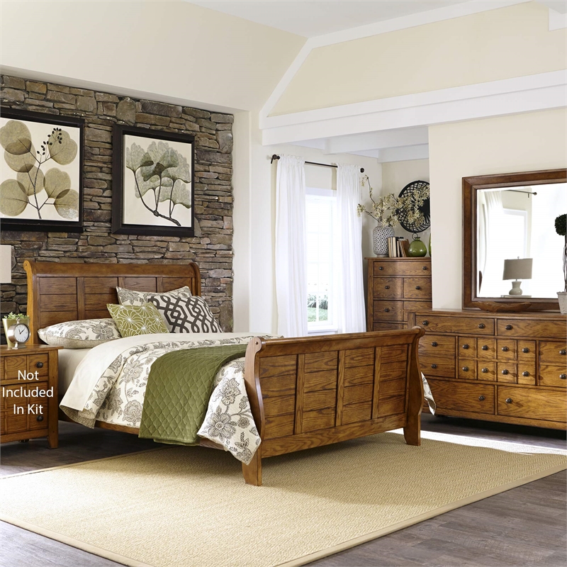 Pemberly Row Queen Sleigh Bed with Dresser Mirror and Chest in Medium Brown