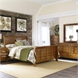 Pemberly Row Queen Sleigh Bed with Dresser Mirror and Chest in Medium Brown
