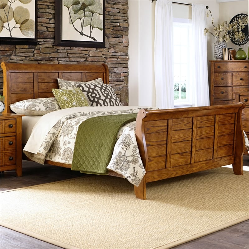 Pemberly Row King Sleigh Bed with Center Slat Support in Medium Brown