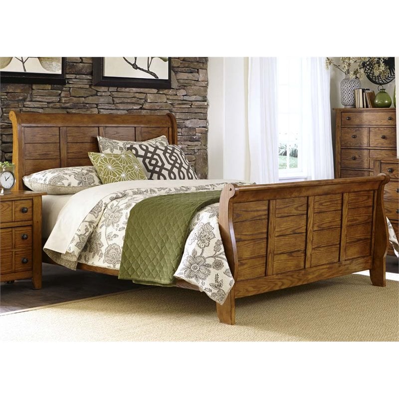 Pemberly Row King Sleigh Bed with Center Slat Support in Medium Brown