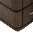 Pemberly Row 9 Drawer Dresser with Starburst Veneer and Bow Shaping in Brown
