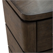 Pemberly Row 9 Drawer Dresser with Starburst Veneer and Bow Shaping in Brown