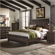 Pemberly Row King Panel Bed with Dresser Mirror and Nightstand in Brown
