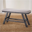 Pemberly Row Counter Height Bench with Trestle Base and Center Shelf in Gray