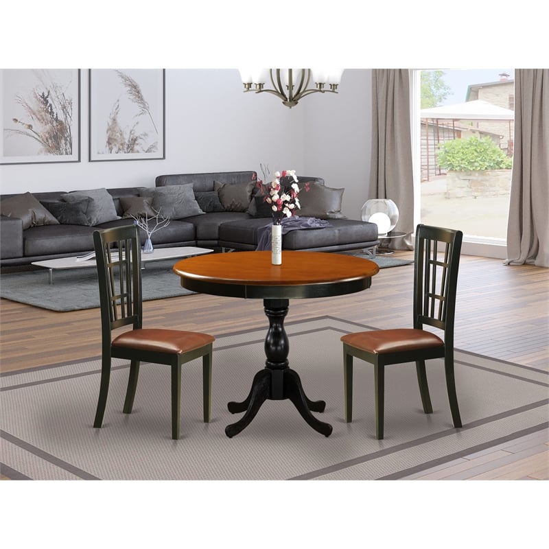 Pemberly Row Round Dining Table and 2 Faux Leather Chairs in Black Finish