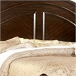 Pemberly Row Eastern King Bed with Paneled Camelback Headboard in Brown