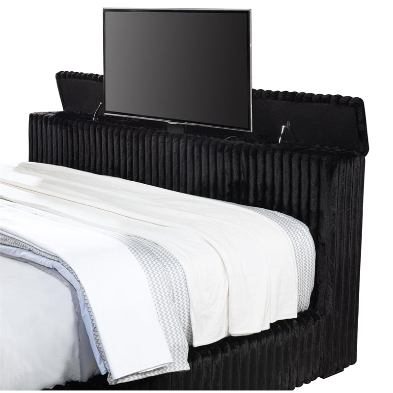 Pemberly Row Upholstered Velvet Eastern King Wingback TV Bed in Black