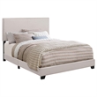 Pemberly Row Nailhead Upholstered Eastern King Bed in Ivory Finish