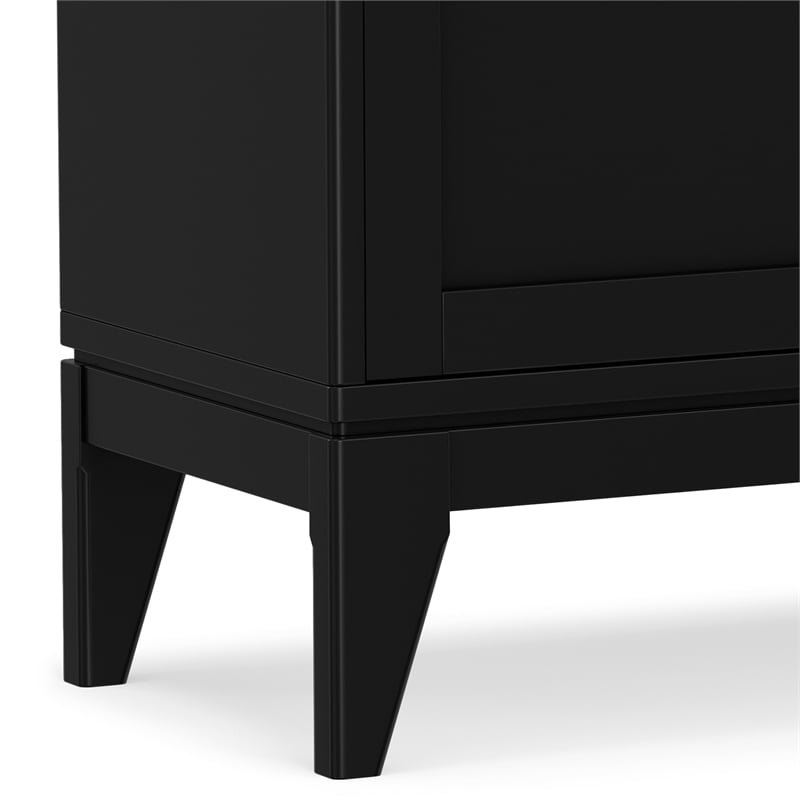 pemberly row mid-century modern low cabinet with sliding doors in black