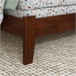 Pemberly Row Twin Wood Foundation Bed with Bookcase Headboard in Walnut