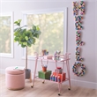 Pemberly Row Metal and Mirrored 2-Level Rolling Bar Cart in Pink