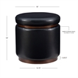 Pemberly Row Round Storage Ottoman in Black Faux Leather with Wood Trim