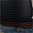 Pemberly Row Round Storage Ottoman in Black Faux Leather with Wood Trim