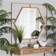Pemberly Row Gates Antique Gold Metal Accent Wall Mirror with Hexagonal Center