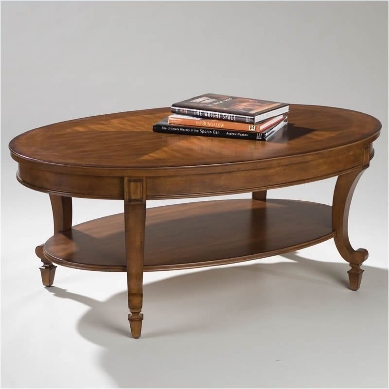 Beaumont Lane Oval Coffee Table In Cinnamon Brown