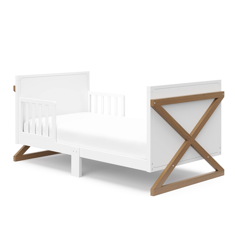 Stork Craft USA Equinox Wood Toddler Bed with Guardrails in White/Driftwood