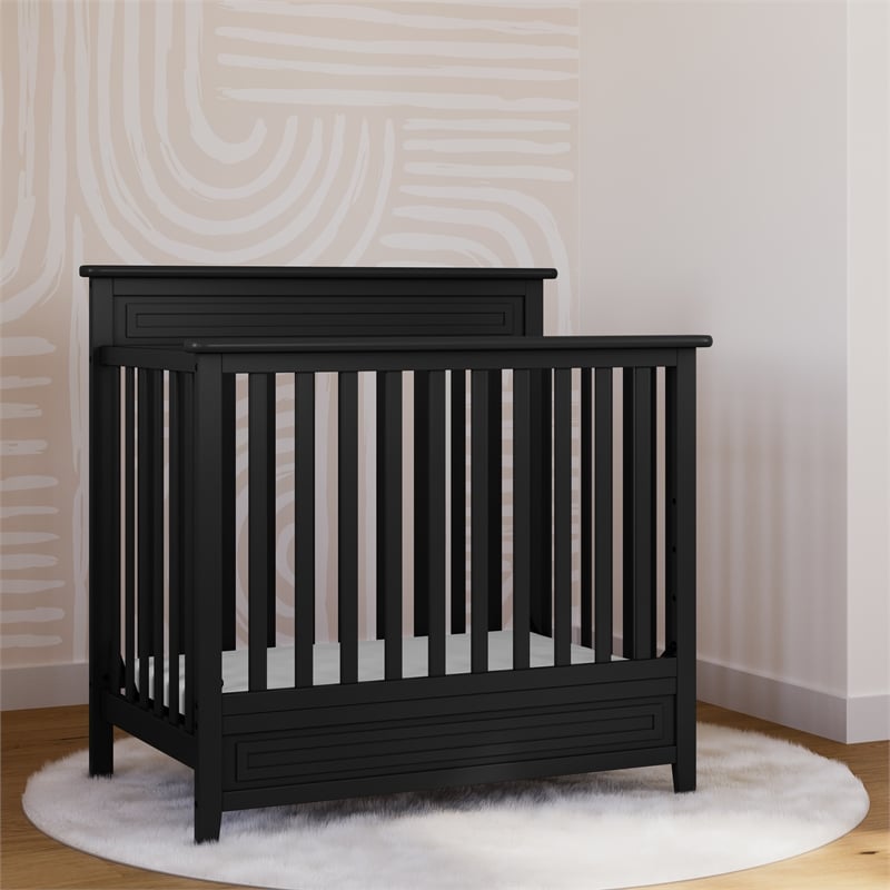 Stork Craft USA Petal 4-in-1 Engineered Wood Convertible Mini Crib in Black