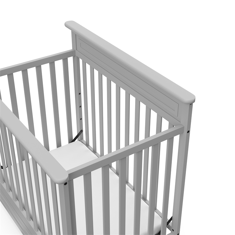 Stork Craft USA Petal 4-in-1 Engineered Wood Convertible Mini Crib in Gray