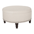 Scranton & Co Round Storage Ottoman in Linen Cream Fabric with Nailheads