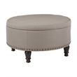 Scranton & Co Round Storage Ottoman in Dolphin Gray Fabric with Nailheads