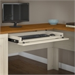 Atlin Designs Farmhouse Wood L Shaped Desk with Hutch in Antique White/Maple