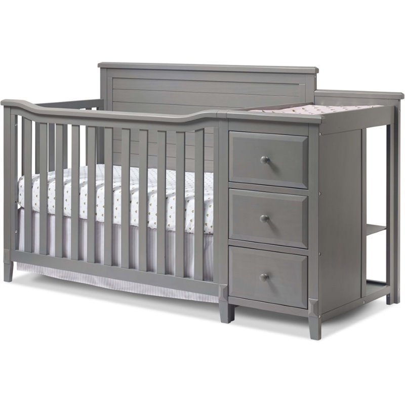 gray crib and changing table