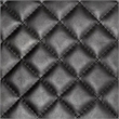 Maklaine Leather Diamond Pattern Accent Chair in Black and Gold