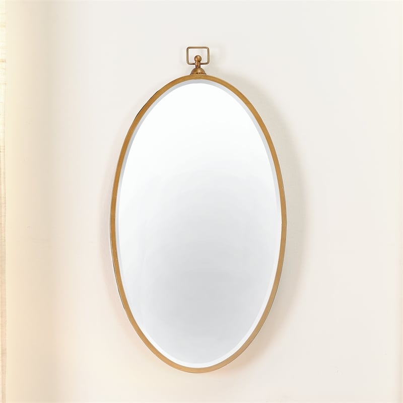 Maklaine Iron Metal/Engineered Wood Accent Mirror in Antique Brass