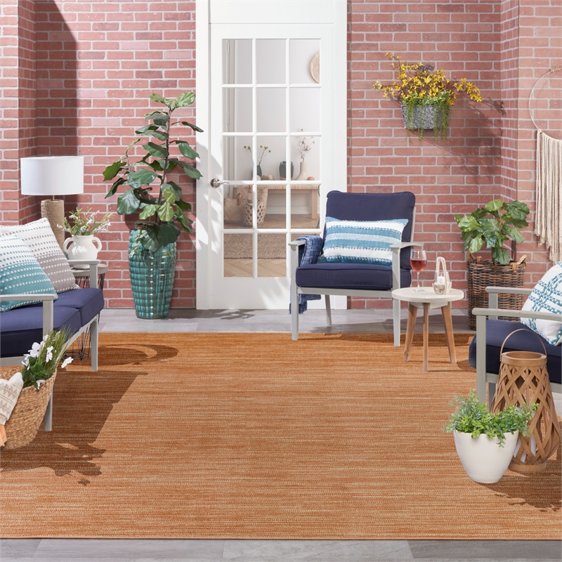 Maklaine Contemporary 10' x 14' Rust Fabric Area Rug in Orange