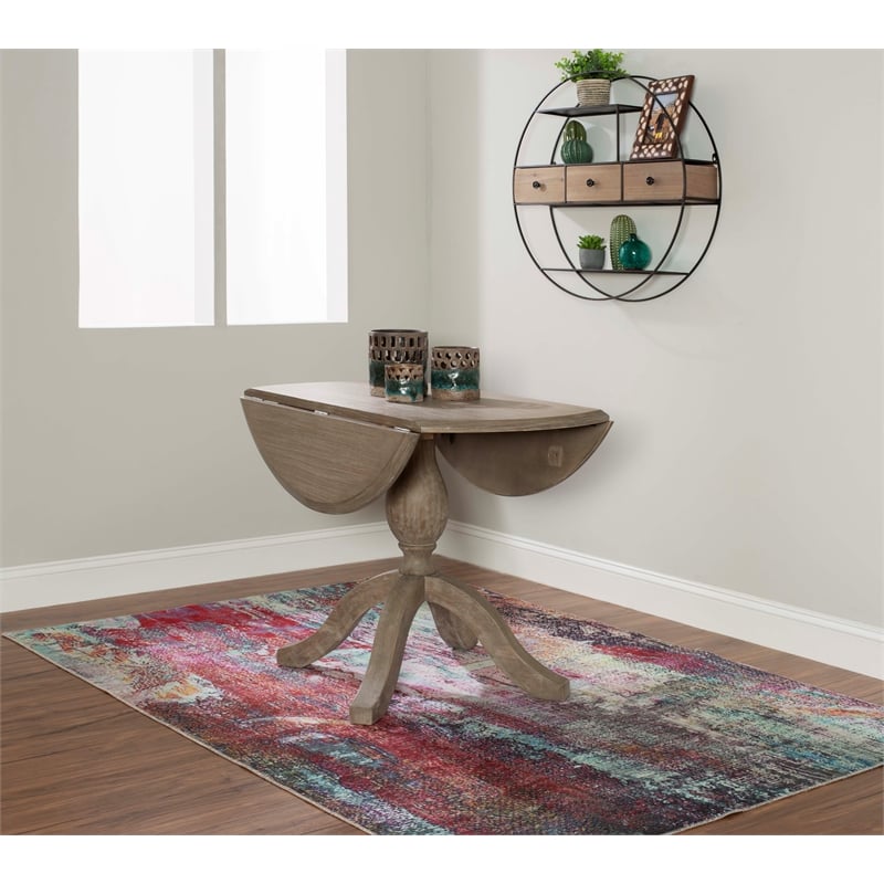 Maklaine Round Drop Leaf Pedestal Dining Table in Rustic Gray Washed Wood