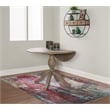 Maklaine Round Drop Leaf Pedestal Dining Table in Rustic Gray Washed Wood