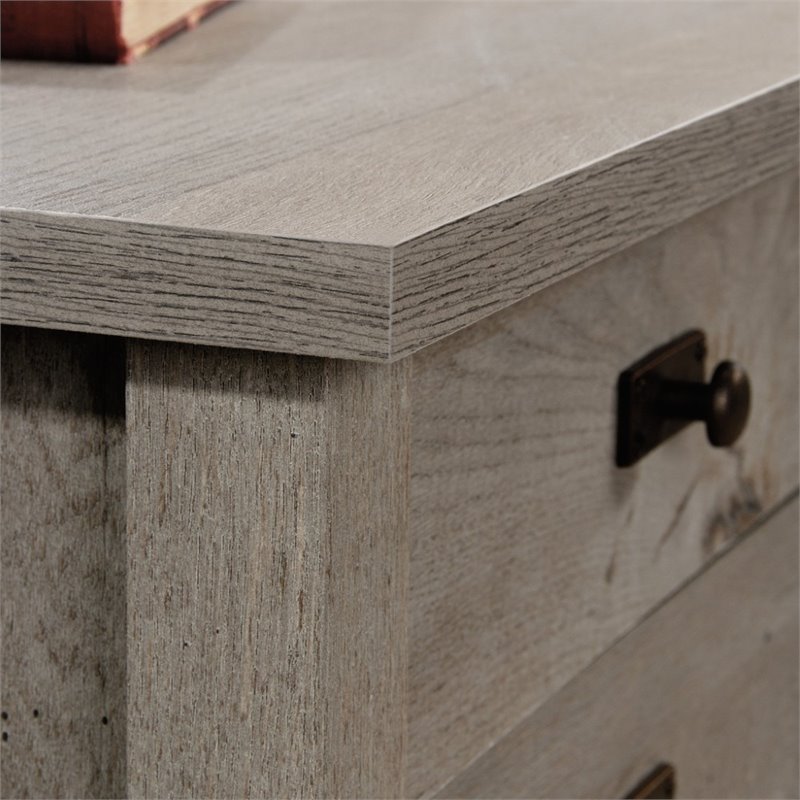 Maklaine Engineered Wood L-Shaped Computer Desk in Mystic Oak