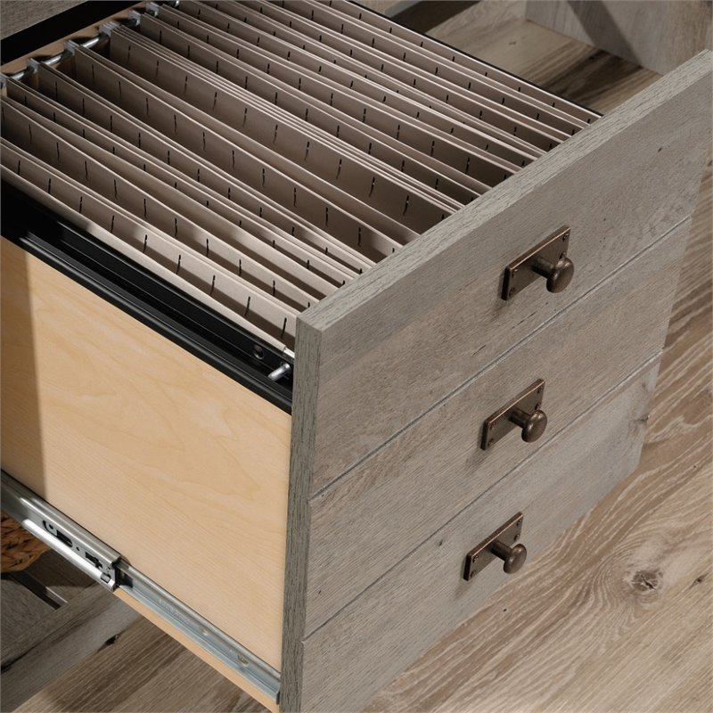 Maklaine Engineered Wood L-Shaped Computer Desk in Mystic Oak