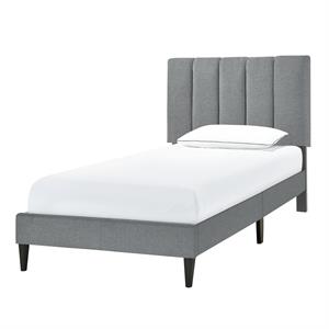 vertically channeled upholstered platform bed in gray