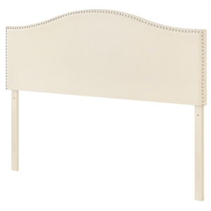 camelback nail trimmed upholstered queen headboard in beige