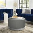 Posh Living Suchada Faux Leather Round Cocktail Ottoman in Gray/Chrome