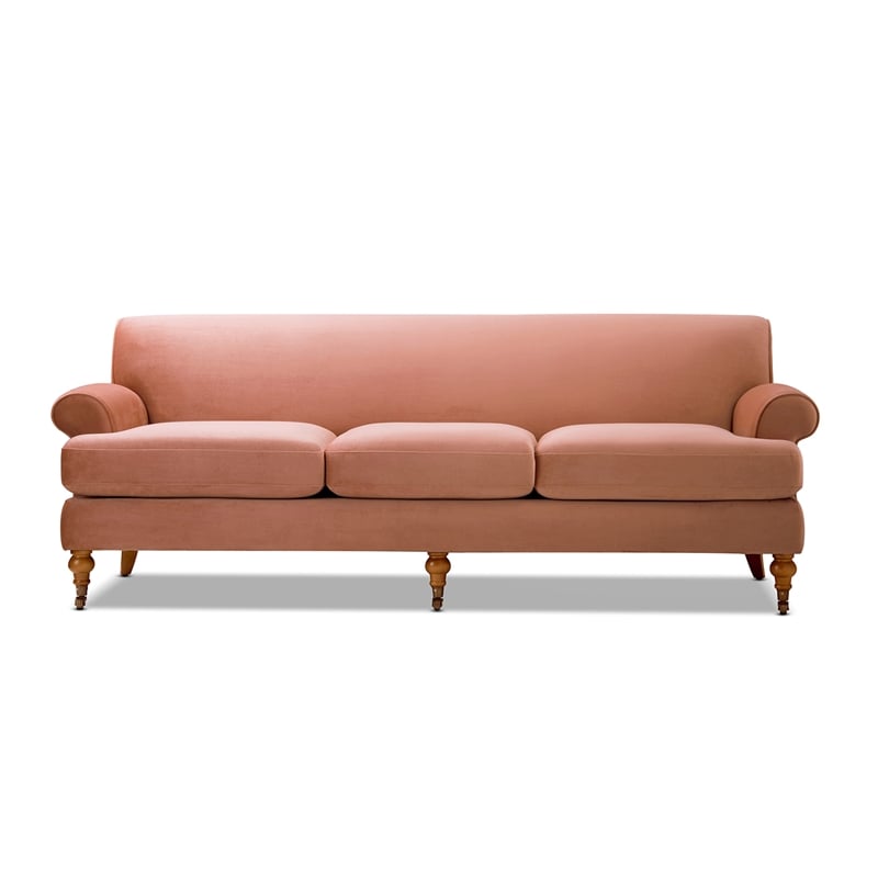 Alana Lawson Recessed Arm Sofa with Metal Casters in Peach Orange