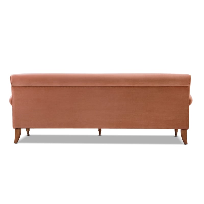 Alana Lawson Recessed Arm Sofa with Metal Casters in Peach Orange