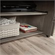 Carell Furniture Engineered Wood Storage Craft Armoire in Mystic Oak