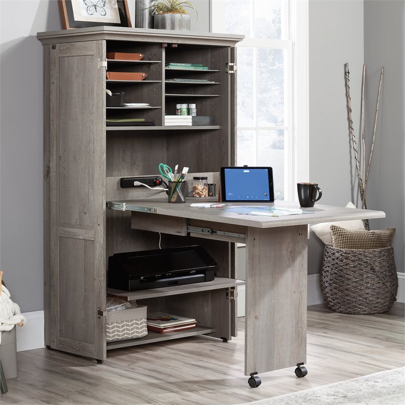 Carell Furniture Engineered Wood Storage Craft Armoire in Mystic Oak