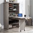 Carell Furniture Engineered Wood Storage Craft Armoire in Mystic Oak