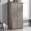 Carell Furniture Engineered Wood Storage Craft Armoire in Mystic Oak